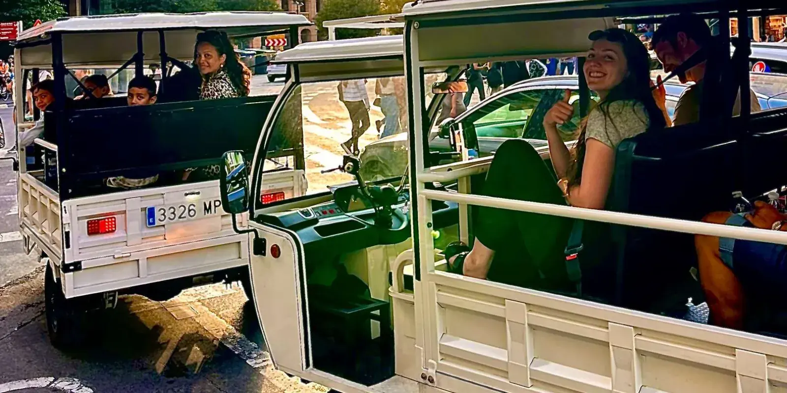 Passengers on a Madrid tuk tuk outing