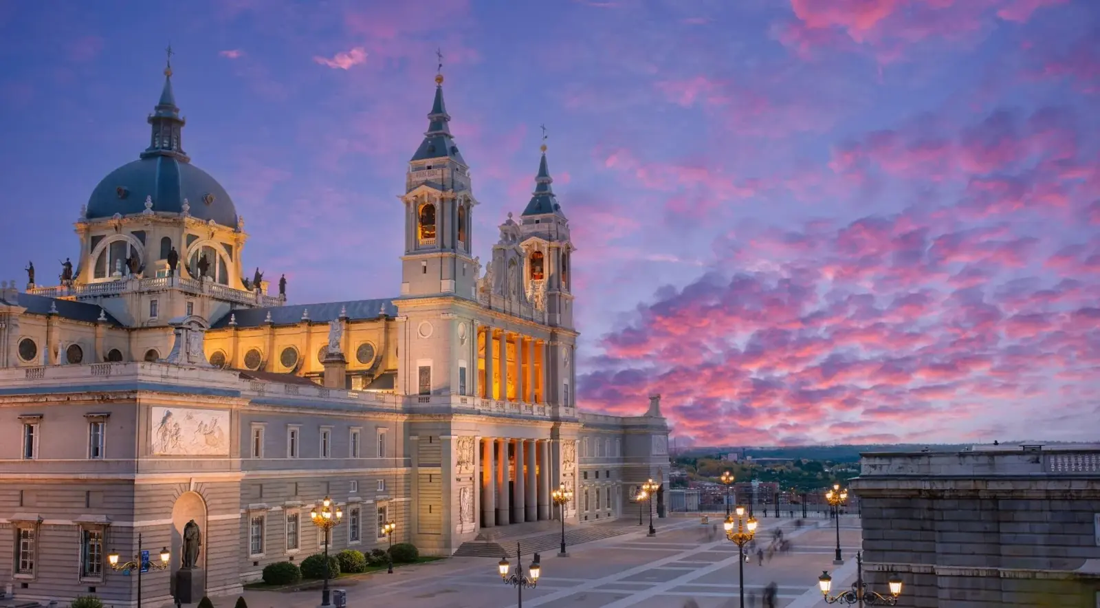 Almudena Cathedral under a colourful evening sky